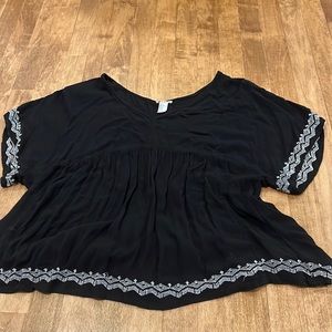 Black shirt with white designs